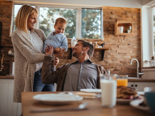 Family is having fun during the breakfast time